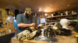 Based in Sitka, Robert Miller makes one-of-a-kind hats and gloves from local animal furs. Also a fisheries biologist for the government, Miller hopes his business will offset any potential budget cutbacks.